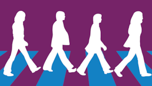 the 4 Beatles walking across the road