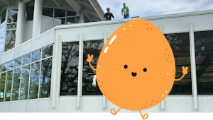 An egg getting tossed off of the library's roof