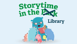 Toy animals reading a book