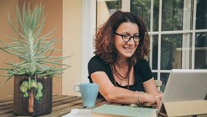 A woman working on a laptop