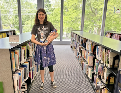 Kaley holding her painted cicada