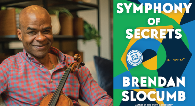 Author Brendan Slocumb holding a violin