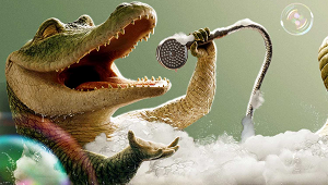 A singing crocodile taking a bath