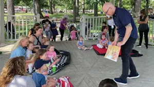 People at an outdoor storytime